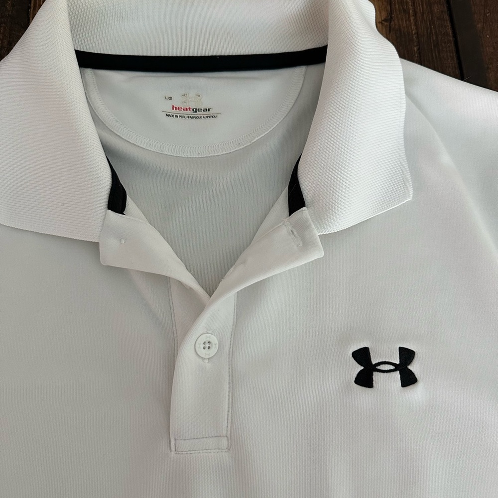Men’s white Under Armour Polo